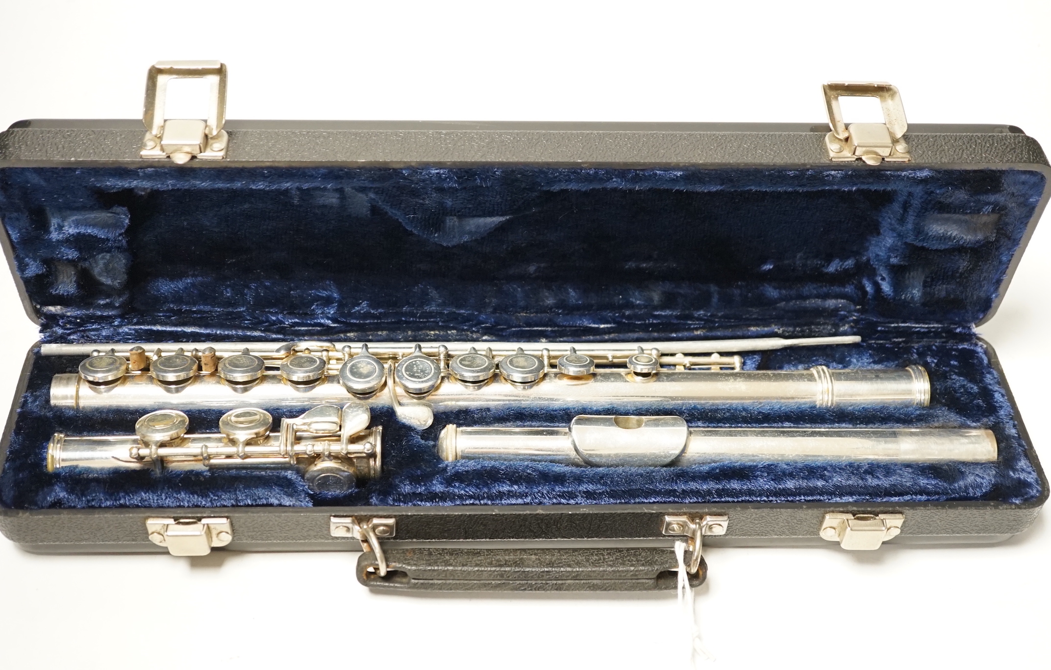 A cased Boosey and Hawkes 400 flute with closed hole key work